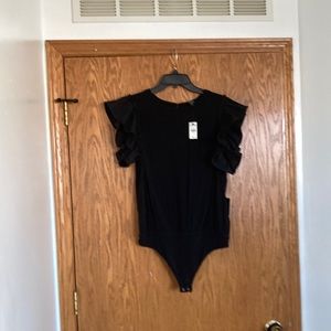 Black bodysuit with exaggerated sleeves